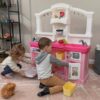 Step2 Fun with Friends Kitchen Set for Kids – Includes Toy Kitchen Accessories, Interactive Features for Pretend Play – Indoor/Outdoor Toddler Playset – Dimensions: 40.88