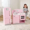 KidKraft Retro Wooden Play Kitchen and Refrigerator 2-Piece Set with Faucet, Sink, Burners and Working Knobs, Pink, Gift for Ages 3+ KidKraft Retro Wooden Play Kitchen and Refrigerator 2-Piece Set with Faucet, Sink, Burners and Working Knobs, Pink, Gift for Ages 3+