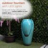 Alpine Corporation DIG100XS 33 in. Tall Water Jar Fountain with LED Light, Turquoise
