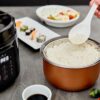 Yum Asia Kumo YumCarb Rice Cooker with Ceramic Bowl and Advanced Fuzzy Logic, (5.5 Cups, 1 Litre), 5 Rice Cooking Functions, 3 Multicooker Functions, 110V US Power (Dark Stainless Steel) Yum Asia Kumo YumCarb Rice Cooker with Ceramic Bowl and Advanced Fuzzy Logic, (5.5 Cups, 1 Litre), 5 Rice Cooking Functions, 3 Multicooker Functions, 110V US Power (Dark Stainless Steel)