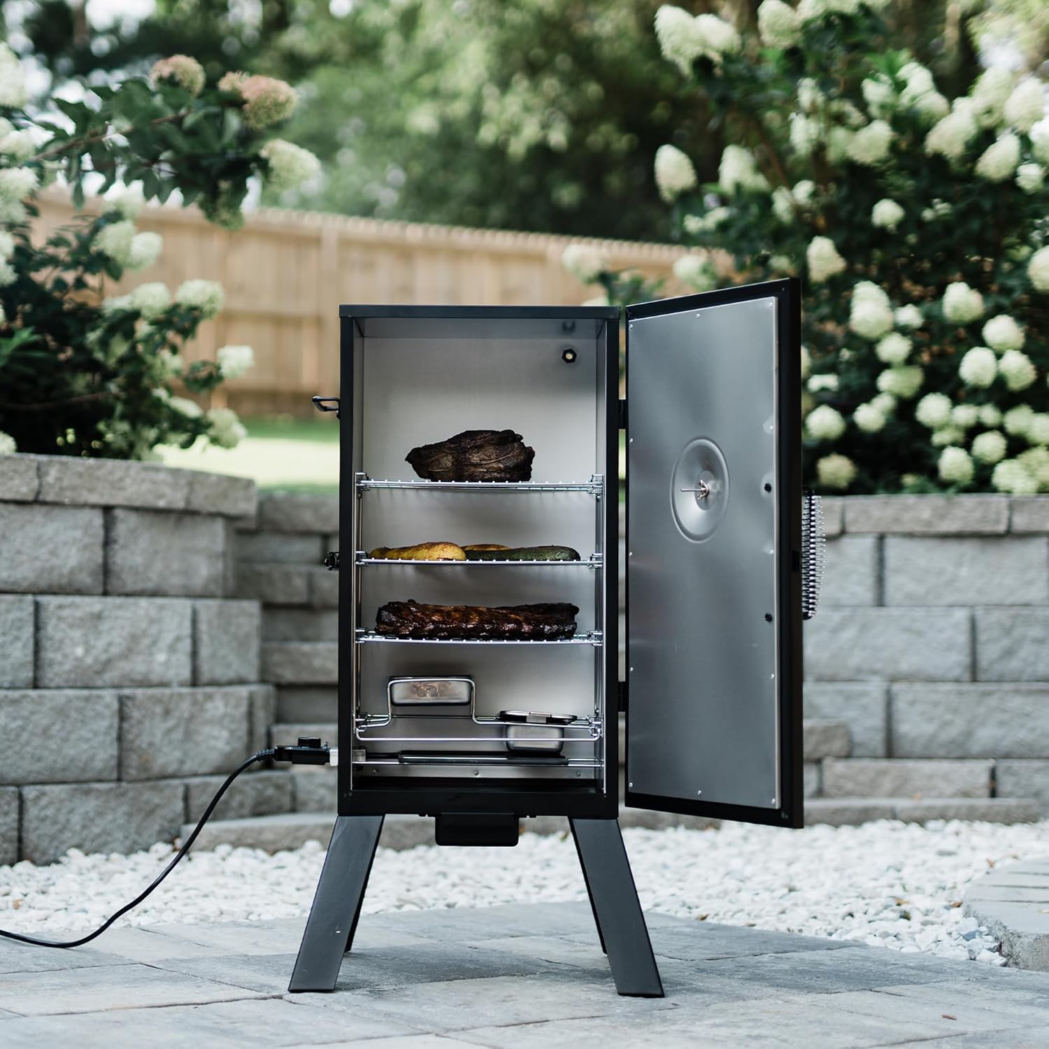 Masterbuilt® 30-inch Electric Vertical BBQ Smoker with Analog Temperature Control, Chrome Smoking Racks and 535 Cooking Square Inches in Black, Model MB200702104 Masterbuilt® 30-inch Electric Vertical BBQ Smoker with Analog Temperature Control, Chrome Smoking Racks and 535 Cooking Square Inches in Black, Model MB20070210