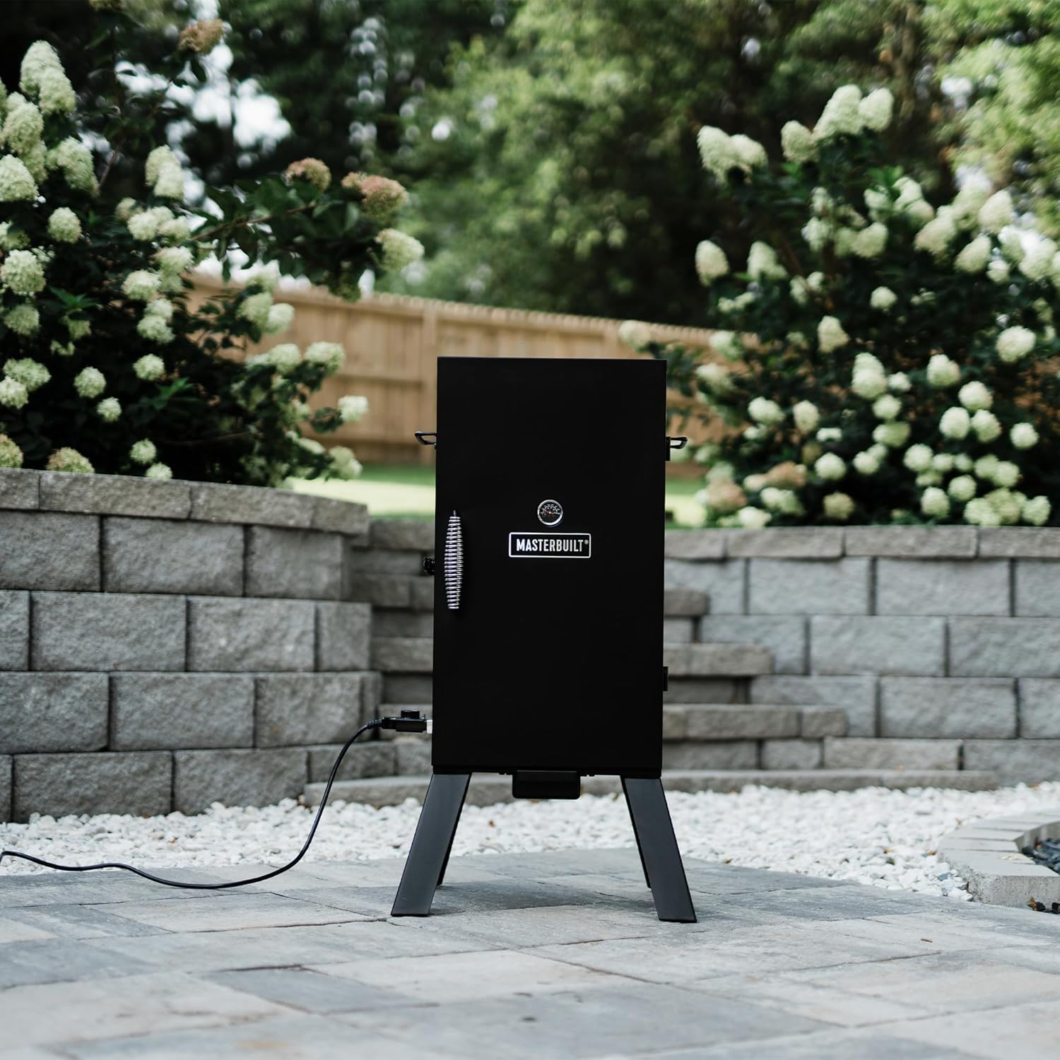Masterbuilt® 30-inch Electric Vertical BBQ Smoker with Analog Temperature Control, Chrome Smoking Racks and 535 Cooking Square Inches in Black, Model MB20070210465 Masterbuilt® 30-inch Electric Vertical BBQ Smoker with Analog Temperature Control, Chrome Smoking Racks and 535 Cooking Square Inches in Black, Model MB20070210