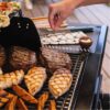 Charbroil 463676724 Pro Series with Amplifire Infrared Technology 2-Burner Propane Gas Grill and Griddle Cabinet, Black