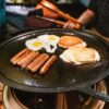 Solo Stove Yukon Griddle + Hub, Cast Iron Cookware with Stainless steel Hub for 8” Elevation, Addition to Yukon fire pit, Weight: 21 lbs, Cooking surface diameter: 17.75"