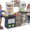 Step2 Modern Metro Kitchen Set for Kids – Includes 30+ Toy Kitchen Accessories, Interactive Features for Pretend Play – Indoor/Outdoor Toddler Playset – Dimensions 44.75" H x 46.5" W x 13.5" D