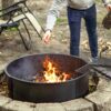 Sunnydaze Metal Fire Pit Ring - 36-Inch Outer/34-Inch Inner Diameter Steel Fire Ring with Cooking Grate and Poker