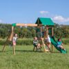 Backyard Discovery Buckley Hill Cedar Wood Swing Set with Wave Slide, Play Deck, Rock Wall Ladder, Belt Swings, Chalkboard, Canopy Roof, Outdoor Playset, Green