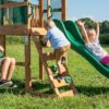 Backyard Discovery Buckley Hill Cedar Wood Swing Set with Wave Slide, Play Deck, Rock Wall Ladder, Belt Swings, Chalkboard, Canopy Roof, Outdoor Playset, Green