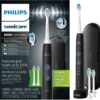 Philips Sonicare ProtectiveClean 5300 Rechargeable Electric Toothbrush, with Pressure Sensor, 3 Cleaning Modes, SmarTimer and QuadPacer, with 2 Bonus Brush Heads, Travel Case, Black, Model HX6423/34