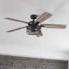 Honeywell 50614-26 Carnegie 52-in Matte Black with Rough Pine/Dark Chestnut Blades Cage Ceiling Fan With Light and Remote Control Included 5 -Blade