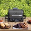 Ninja OG751 Woodfire Pro Outdoor Grill Built-In Thermometer,7-in-1 Master Grill,BBQ Smoker,& Outdoor Air Fryer Plus Bake,Roast,Dehydrate & Broil,Woodfire Technology,Weather-Resistant,Grey XL Ninja OG751 Woodfire Pro Outdoor Grill Built-In Thermometer,7-in-1 Master Grill,BBQ Smoker,& Outdoor Air Fryer Plus Bake,Roast,Dehydrate & Broil,Woodfire Technology,Weather-Resistant,Grey XL