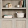 Sauder Miscellaneous Storage Bookcase with Doors, Adjustable Shelves, 5 Shelf Bookcase - Chalked Chestnut Finish Sauder Miscellaneous Storage Bookcase with Doors, Adjustable Shelves, 5 Shelf Bookcase - Chalked Chestnut Finish