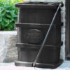 FCMP Outdoor Slim Line Design 45-Gallon Wood Grain Outdoor Home Rain Water Catcher Barrel Flat Back Container with Spigots and Mesh Screen, Black