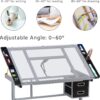 Yaheetech Glass Drafting Table with Storage, Adjustable Art Drawing Desk | Tempered glass top on a steel frame tilts 0-60° for drawing, tracing, or diamond art, plus two fabric drawers and side trays.